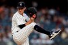 New York Yankees pitcher Andrew Heaney winds up during the first inning of the team's baseball game against the Boston Red Sox on Wednesday, Aug. 18, 2021, in New York. (AP Photo/Adam Hunger)