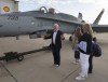 Conservative Leader Erin O'Toole, his wife, Rebecca, and their children check out a CF-18 Hornet parked near their campaign plane as they arrive in Edmonton, Saturday, Aug. 21, 2021. THE CANADIAN PRESS/Ryan Remiorz