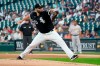 Chicago White Sox starting pitcher Lance Lynn winds up during the first inning of the team's baseball game against the Oakland Athletics on Wednesday, Aug. 18, 2021, in Chicago. (AP Photo/Charles Rex Arbogast)