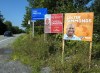Election campaign signs dot the landscape in East Preston, N.S., on Wednesday, Aug. 25, 2021. The federal Liberals hold most of the 32 seats in Atlantic Canada but pundits are musing that Prime Minister Justin Trudeau's party may have a difficult time maintaining that level of regional support this election. THE CANADIAN PRESS/Andrew Vaughan