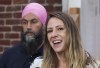 Candidate Ruth Ellen Brosseau responds to a question as NDP leader Jagmeet Singh looks on during a campaign stop in Yamachiche, Quebec on Sunday, August 29, 2021. THE CANADIAN PRESS/Paul Chiasson