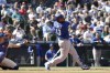 Kansas City Royals' Salvador Perez (13) hits a home run as Seattle Mariners catcher Cal Raleigh, left, looks on during the sixth inning of a baseball game Sunday, Aug. 29, 2021, in Seattle. (AP Photo/Jason Redmond)