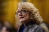 Liberal MP Karen McCrimmon stands during question period in the House of Commons on Parliament Hill in Ottawa on Monday, Oct. 22, 2018. McCrimmon isn't seeking re-election in a west-Ottawa riding.&nbsp;THE CANADIAN PRESS/Sean Kilpatrick