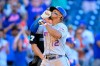 New York Mets' Francisco Lindor (12) celebrates his two-run home run during the ninth inning of the first baseball game of a doubleheader against the Washington Nationals, Saturday, Sept. 4, 2021, in Washington. The Mets won 11-9 in extra innings. (AP Photo/Nick Wass)