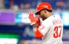 Philadelphia Phillies' Odubel Herrera (37) reacts after singling in a run during the 10th inning of a baseball game against the Miami Marlins, Sunday, Sept. 5, 2021, in Miami. (AP Photo/Rhona Wise)