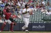 Milwaukee Brewers' Daniel Vogelbach hits a walk-off grand slam during the ninth inning of a baseball game against the St. Louis Cardinals Sunday, Sept. 5, 2021, in Milwaukee. The Brewers won 6-5. (AP Photo/Morry Gash)