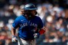 Toronto Blue Jays' Vladimir Guerrero Jr. smiles after hitting a single against the New York Yankees during the eighth inning of a baseball game on Monday, Sept. 6, 2021, in New York. (AP Photo/Adam Hunger)