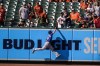 Kansas City Royals left fielder Andrew Benintendi makes a catch on a ball hit by Baltimore Orioles' Anthony Santander during the ninth inning of a baseball game, Monday, Sept. 6, 2021, in Baltimore. The Royals won 3-2. (AP Photo/Julio Cortez)