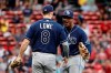 Tampa Bay Rays' Wander Franco celebrates with Brandon Lowe (8) after they defeated the Boston Red Sox in 10 innings of a baseball game Monday, Sept. 6, 2021, at Fenway Park in Boston. (AP Photo/Winslow Townson)