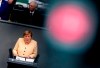 German Chancellor Angela Merkel speaks during a debate about the situation in Germany ahead of the upcoming national election in Berlin, Germany, Tuesday, Sept. 7, 2021. National elections are scheduled in Germany for Sept. 26, 2021. (AP Photo/Markus Schreiber)