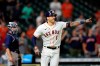 Houston Astros' Carlos Correa (1) celebrates after hitting a game-winning RBI ground-rule double against the Seattle Mariners during the 10th inning of a baseball game Tuesday, Sept. 7, 2021, in Houston. The Astros won 5-4 in 10 innings. (AP Photo/David J. Phillip)