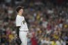 San Diego Padres starting pitcher Blake Snell watches the first hit by the Los Angeles Angels, a two-RBI single by Jo Adell, during the seventh inning of a baseball game Tuesday, Sept. 7, 2021, in San Diego. (AP Photo/Gregory Bull)