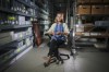 Jan Ramirez, chief curator at the 9/11 Memorial & Museum, sits for an interview inside a warehouse where thousands of artifacts from the 9/11 attacks are archived, July 16, 2021, in Jersey City, N.J. Over the years, the museum has collected some 22,000 personal artifacts to help tell the stories of those who died and those lucky to survive. Many of those personal effects were plucked from the ruins of what was once the Twin Towers. Other items were donated by survivors or by the families of those who perished. (AP Photo/Robert Bumsted)