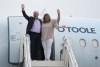 Conservative Leader Erin O'Toole and his wife, Rebecca O'Toole, wave as they step off the campaign plane in London, Ont., Friday, Sept. 17, 2021. O'Toole says Justin Trudeau wants Canadians who are angry to vote for 