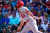 St. Louis Cardinals' Paul Goldschmidt watches his one-run single during the sixth inning in the first baseball game of a doubleheader against the Chicago Cubs in Chicago, Friday, Sept. 24, 2021. (AP Photo/Nam Y. Huh)