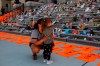 Emmy Morris and her daughter Sharon Morris-Jones, 4, of the Tsartlip First Nation, look at orange shirts, shoes, flowers and messages on display on the steps of the legislature in Victoria on Tuesday, June 8, 2021. The first National Day for Truth and Reconciliation is taking place on Thursday and communities across the country are preparing to commemorate the day with virtual and in-person events. THE CANADIAN PRESS/Chad Hipolito