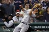 New York Yankees' DJ LeMahieu misses the catch on a pop foul by Boston Red Sox's Kyle Schwarber during the seventh inning of a baseball game, Sunday, Sept. 26, 2021, in Boston. (AP Photo/Michael Dwyer)