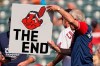 A Cleveland Indians fan holds up a sign during a baseball game between the Kansas City Royals and the Cleveland Indians, Monday, Sept. 27, 2021, in Cleveland. Cleveland plays its final home game against the Royals as the Indians, the team's nickname since 1915. The club will be called the Cleveland Guardians next season. (AP Photo/Tony Dejak)