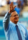 FILE - Jaime Jarrin, Los Angeles Dodgers Hall of Fame Spanish-language broadcaster, is honored for his 54 years with the team before an interleague game against the Los Angeles Angels at Dodger Stadium in Los Angeles, in this Monday, June 11, 2012, file photo. Hall of Fame broadcaster Jaime Jarrín will retire as the Los Angeles Dodgers’ Spanish-language announcer following the 2022 season, ending a 64-year run with the team. Jarrín announced his decision on Tuesday, Sept. 28, 2021, saying he wants to spend more time with his two sons and grandchildren as well as travel. He turns 86 in December. (AP Photo/Reed Saxon, File)