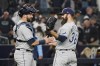 Tampa Bay Rays pitcher Andrew Kittredge (36) and catcher Francisco Mejia celebrate after they defeated the New York Yankees in a baseball game, Friday, Oct. 1, 2021, in New York. The Rays won 4-3. (AP Photo/Mary Altaffer)