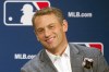 FILE - In this Dec. 7, 2016, file photo, Chicago Cubs general manager Jed Hoyer smiles during a press conference in Oxon Hill, Md. The question for Hoyer is how quickly the Cubs can get back to the playoffs after missing out for the second time in seven years. (AP Photo/Cliff Owen, File)
