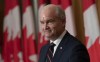 Conservative Leader Erin O'Toole listens to a question from a reporter during a news conference following caucus in Ottawa, Tuesday, Oct. 5, 2021. THE CANADIAN PRESS/Adrian Wyld