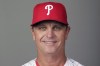 FILE - This is a 2019 file photo showing Bobby Dickerson of the Philadelphia Phillies baseball team. The Philadelphia Phillies hired Bobby Dickerson on Monday, Oct. 25, 2021, for a second stint as their infield coach.The 56-year-old Dickerson served as Philadelphia's infield coach in 2019. He spent the last two seasons with the San Diego Padres, serving as bench coach in 2020 and also third base coach this past season. “Bobby was highly recommended by our players who worked with him in 2019, they loved him,” Phillies manager Joe Girardi said. (AP Photo/File)