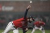 Atlanta Braves starting pitcher Ian Anderson throws during the first inning in Game 3 of baseball's World Series between the Houston Astros and the Atlanta Braves Friday, Oct. 29, 2021, in Atlanta. (AP Photo/David J. Phillip)