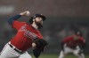 Atlanta Braves starting pitcher Ian Anderson throws during the first inning in Game 3 of baseball's World Series between the Houston Astros and the Atlanta Braves Friday, Oct. 29, 2021, in Atlanta. (AP Photo/David J. Phillip)