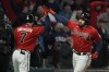 Atlanta Braves' Travis d'Arnaud celebrates his home run with Dansby Swanson during the eighth inning in Game 3 of baseball's World Series between the Houston Astros and the Atlanta Braves Friday, Oct. 29, 2021, in Atlanta. (AP Photo/Brynn Anderson)