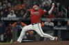 Atlanta Braves relief pitcher Tyler Matzek throws during the eighth inning in Game 3 of baseball's World Series between the Houston Astros and the Atlanta Braves Friday, Oct. 29, 2021, in Atlanta. (AP Photo/Brynn Anderson)