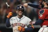 Houston Astros' Jose Altuve reacts after striking out during the third inning in Game 3 of baseball's World Series between the Houston Astros and the Atlanta Braves Friday, Oct. 29, 2021, in Atlanta. (AP Photo/David J. Phillip)