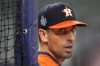 Houston Astros catcher Jason Castro watches during batting practice before Game 1 in baseball's World Series against the Atlanta Braves Tuesday, Oct. 26, 2021, in Houston. (AP Photo/David J. Phillip)