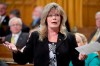 Shelly Glover answers a question during Question Period in the House of Commons on Parliament Hill in Ottawa, on Monday March 23, 2015. THE CANADIAN PRESS/Adrian Wyld