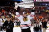 Chicago Blackhawks center Jonathan Toews lifts the Stanley Cup after the Chicago Blackhawks beat the Philadelphia Flyers 4-3 in overtime to win Game 6 of the NHL Stanley Cup hockey finals in Philadelphia on June 9, 2010. THE CANADIAN PRESS/AP, Kathy Willens