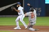 Toronto Blue Jays' Marcus Semien throws to first to complete a double play on Baltimore Orioles' Trey Mancini after forcing out Austin Hays in the fourth inning of an American League baseball game in Toronto on Friday, Oct. 1, 2021.&nbsp;The Toronto infielder won an American League Gold Glove at second base. It was the 31-year-old’s first time winning the award. THE CANADIAN PRESS/Jon Blacker