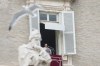 Pope Francis recites the Angelus noon prayer in St. Peter's Square, at the Vatican, Sunday, Nov. 14, 2021. (AP Photo/Gregorio Borgia)