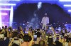 El Salvador's President Nayib Bukele participates in the closing ceremony of a congress for cryptocurrency investors in Santa Maria Mizata, El Salvador, Saturday, Nov. 20, 2021. Bukele announced during the rock concert-like atmosphere at the gathering that his government will build an oceanside 