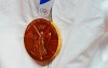 The gold medal of United States's Diana Taurasi hangs as she stands on the podium during the medal ceremony for women's basketball at the 2020 Summer Olympics,&nbsp;in Saitama, Japan, Sunday, Aug. 8, 2021. THE CANADIAN PRESS/AP-Charlie Neibergall