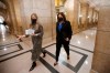 Manitoba Premier Heather Stefanson, right, walks to her office with her assistant Olivia Billson after speaking to media before the reading of the Speech from the Throne at the Manitoba Legislature in Winnipeg, Tuesday, Nov. 23, 2021.  THE CANADIAN PRESS/John Woods