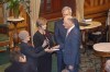 New Brunswick Progressive Conservative MLA Trevor Holder, right, is sworn in as Minister of Post-Secondary Education, Training and Labour at the New Brunswick Legislature in Fredericton, Friday, Nov. 9, 2018. The New Brunswick government will increase the province's minimum wage by $2 per hour next year - the largest increase in 40 years. THE CANADIAN PRESS/James West