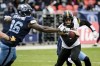 Hamilton Tiger-Cats quarterback Dane Evans (9) evades Toronto Argonauts defensive lineman Sam Acheampong (96) during first half CFL Eastern Conference final action in Toronto, on Sunday, December 5, 2021. THE CANADIAN PRESS/Christopher Katsarov