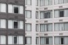 A hotel worker is seen in a hotel window in Mississauga, Ont. by the Pearson International Airport on Monday, Feb. 22, 2021 as new air travel rules come into effect in Canada. THE CANADIAN PRESS/Cole Burston