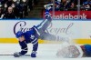 Toronto Maple Leafs forward Mitchell Marner (16) is tripped up by Colorado Avalanche defenceman Bowen Byram (4) during second period NHL hockey action in Toronto on December 1, 2021. THE CANADIAN PRESS/Nathan Denette