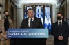 Quebec Premier Francois Legault speaks at a news conference marking the end of the fall session, Friday, December 10, 2021 at his office in Quebec City. Legault is flanked by Quebec deputy premier and Public Security Minister Genevieve Guilbault, left, and Quebec Justice Minister Simon Jolin-Barrette. THE CANADIAN PRESS/Jacques Boissinot