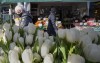 A woman shops at a small grocery store in Toronto on Tuesday December 8, 2020. Small business owners say Canadians haven't lost the urge to support independent and local businesses this year, but meeting customer needs has become more tricky.THE CANADIAN PRESS/Frank Gunn