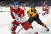 Czechia's Jan Mysak (19) and Germany's Markus Schweiger (26) battle for the puck during second period IIHF World Junior Hockey Championship action in Edmonton on Monday, December 27, 2021. THE CANADIAN PRESS/Jason Franson