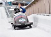 Elana Meyers Taylor from USA takes first place at the Bobsleigh World Cup in Winterberg, Germany, Saturday, Jan. 8, 2022 . (Caroline Seidel/dpa via AP)