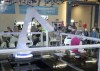 A robotic bartender mixes drinks at the main media centre Tuesday, February 1, 2022 at the 2022 Winter Olympics in Beijing THE CANADIAN PRESS/Ryan Remiorz