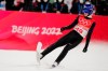 Ryoyu Kobayashi, of Japan, celebrates after his jump during the men's normal hill individual ski jumping first round to win gold at the 2022 Winter Olympics, Sunday, Feb. 6, 2022, in Zhangjiakou, China. (AP Photo/Matthias Schrader)